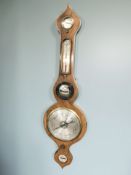 A walnut and satinwood inlaid banjo barometer with silvered dial, signed 'Chenery Bungay',