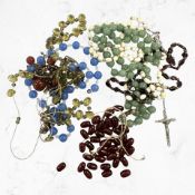 A group of various beads to include red bakelite, jadeite, etc.