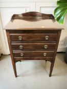 An Edwardian three drawer music chest, width 53 cm.