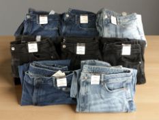 Eight pairs of M&S lady's denim jeans in various sizes, with retail tags.