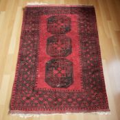 A Turkoman rug, Afghanistan, 181 cm x 119 cm.