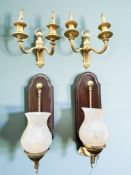 A pair of early 20th century twin branch ormolu wall sconces, wired for electricity, height 28 cm,