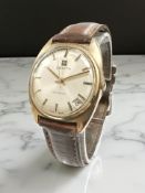 A gent's vintage Zenith 9ct gold automatic centre seconds calendar wristwatch, case 34 mm.