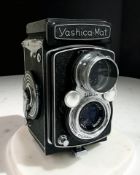 A Yashica-Mat Copal-MXV TLR medium format film camera, with Yashinon 1:3.5 f=80mm lens.
