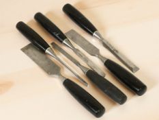 Six Stanley chisels.