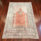 An Egyptian machine-made prayer rug,