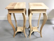 A pair of reproduction hardwood plant stands, height 76 cm.