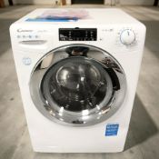 A Candy 10kg washing machine.
