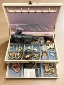 A jewellery box containing costume jewellery, watches, bangles, simulated pearls,