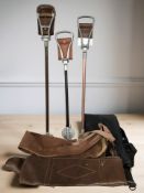 Two gun slips and three shooting sticks.