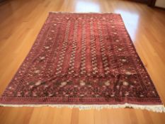 A Turkoman carpet, Afghanistan, 386 cm x 251 cm.