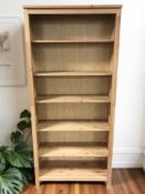 A modern pine effect open bookcase, 90 cm x 36 cm x 197 cm.