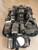 A group of Nikon items to include D200, D7100, F-601 (x2), and F100 camera bodies,
