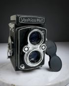 A Yashica-Mat Copal-MXV TLR medium format film camera, with Lumaxar 1:3.2 f=80mm twin lens.