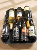 Seven various bottles of alcohol including Echo Falls wine, Marino, Camerons Ale, etc.