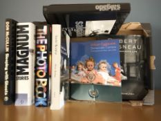 Modern volumes relating to photographing including Robert Doisneau, Andre Kertesz, etc.