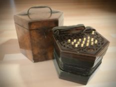 A 19th century fifteen button concertina by Metzler & Co.