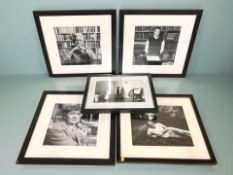 A group of five framed monochrome photographic prints