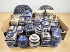 A collection of Ringtons caddies, chintz tea pots, plates, two Maling lustre jugs.