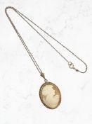 A 9ct yellow gold mounted cameo pendant on chain CONDITION REPORT: The chain is