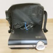 A Toshiba TDP-T45 projector, with lead and carry bag.