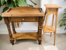 A reproduction pine single drawer hall table, width 78 cm, together with a plant stand.