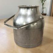 An aluminium swing-handled milk churn, height 50 cm.