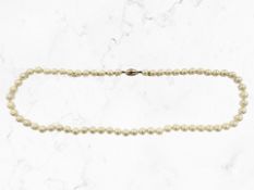 A cultured pearl necklace with 14ct yellow gold clasp,