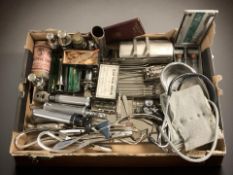 A collection of vintage medical instruments.