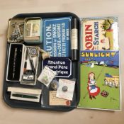 A group of reproduction enameled signs, Wills cigarette cards, Parker Slimford pen,