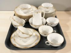 Thirty one pieces of continental gilt rimmed tea china.