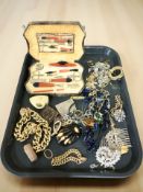 Assorted costume jewellery including gold plated chains, padlock bracelet, various necklaces,