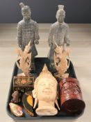 A pair of Chinese terracotta army statues and other oriental wares including a Thai carved wooden