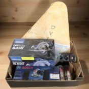 A Draper 20 volt brushless circular saw in box, Bosch angle grinder, 300 watt power inverter,