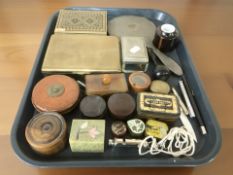 A silver dressing table hand mirror with engine turned decoration, together with a group of tins,