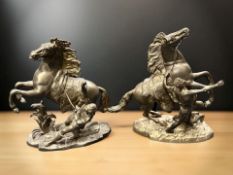 A pair of cast brass Marley horses, height 39 cm.