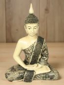 A resin figure of Buddha, height 29 cm.