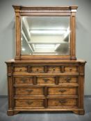 A Barker & Stonehouse stained pine eleven drawer chest, 162 cm x 54 cm x 112 cm,