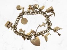 A 9ct yellow gold charm bracelet CONDITION REPORT: 33.6g gross.