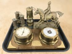 A brass figure of a man on horseback,