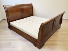 A contemporary stained hardwood 6 ft sleigh bed, overall dimensions 233 cm L x 197 cm W x 122 H.