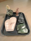 Four African carved granite modernist busts, tallest 25 cm,