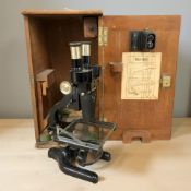 A Prior of London microscope numbered 14946, in wooden carry case.