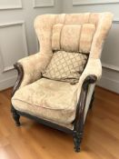 A contemporary wingback armchair, width 91 cm.