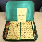 A Mahjong set in travel case.