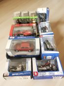 Ten various die cast scale motorcycles and cars including Maisto and Bburago, in boxes.
