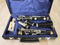 A five piece clarinet by Crampon & Cie, Paris, in fitted case.