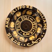 A modern slipware bowl, diameter 29 cm.