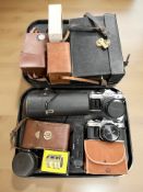 A collection of 35mm and 8mm film cameras to include Canon AE-1 with Canon FD 1:1.