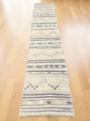 A kilim runner,